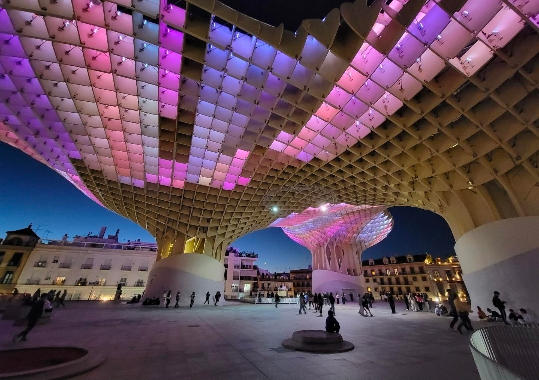 Setas de Sevilla lighting up at blue hour